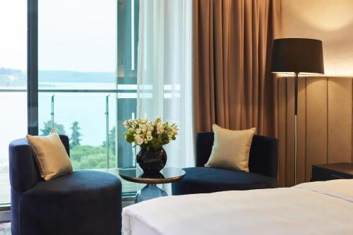 Grand Deluxe with Terrace Sea View and Extra bed (2 Adults + 1 Child)