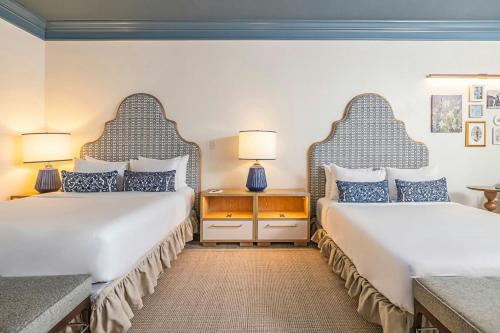 Deluxe Queen Room with Two Queen Beds and Balcony - City View