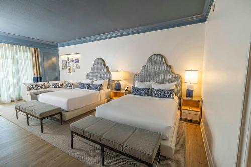 Deluxe Queen Room with Two Queen Beds and Balcony - City View