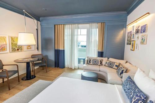 Deluxe Queen Room with City View and Balcony - Mobility/Hearing Accessible with Roll-In Shower