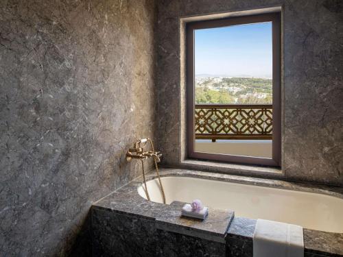 Two-Bedroom Apartment with One King Bed, Two Single Beds and Private Garden