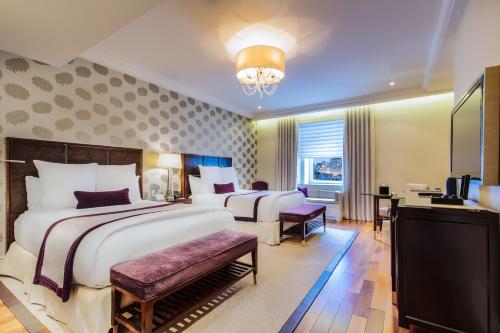 Large Signature Queen Room with Two Queen Beds and City View