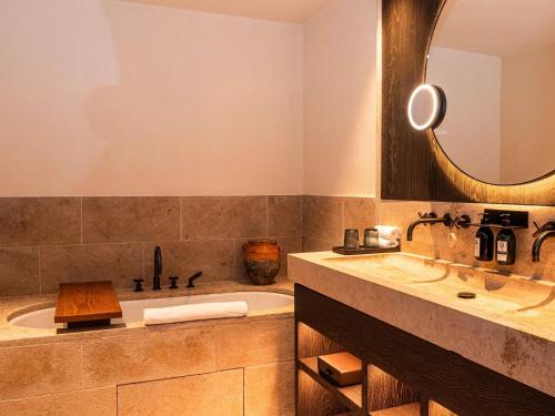 Junior King Suite with Balcony and Pool View