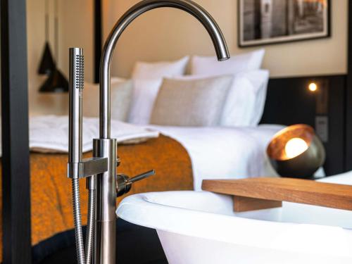 Junior King Suite with Balcony and Pool View