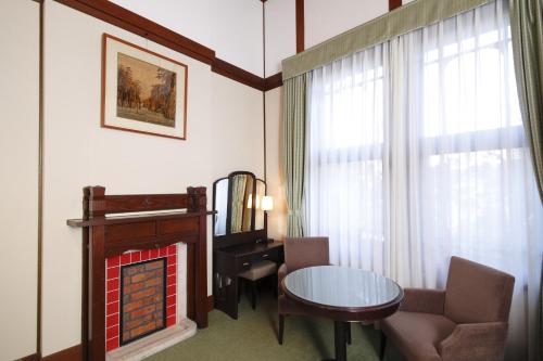 Standard Twin Room with City View - Main Wing -Non-Smoking