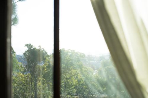 Standard Twin Room with City View - Main Wing -Non-Smoking