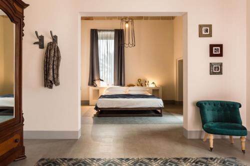 Suite with Balcony and Garden View