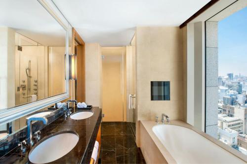 Large Grand Deluxe Room with Two Double Beds and City View