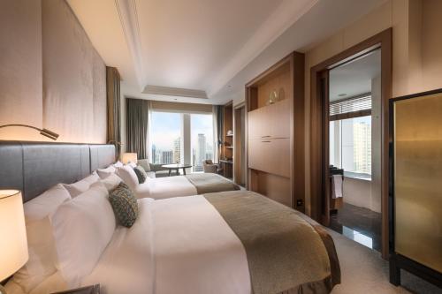 Large Grand Deluxe Room with Two Double Beds and City View