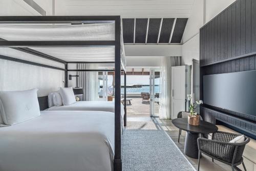Sunrise Two Bedroom Water Suite - Room Rate inclusive of breakfast for 4 adults