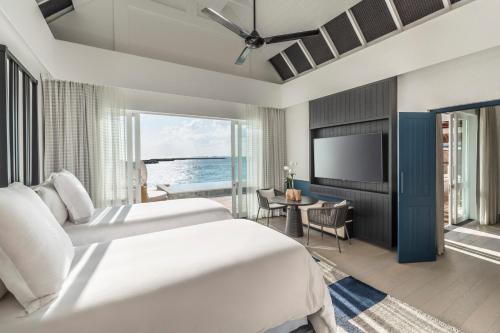 Sunrise Two Bedroom Water Suite - Room Rate inclusive of breakfast for 4 adults