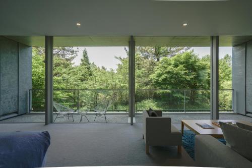 Suite with Sofa Bed and Open-Air Bath Lower Level Floor