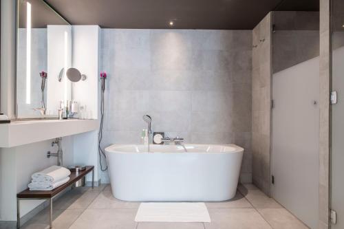 King Suite with Sofa Bed and Lounge Area - Pool View