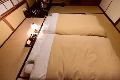 Japanese-Style Economy Twin Room with Shared Bathroom - "Chikyu"