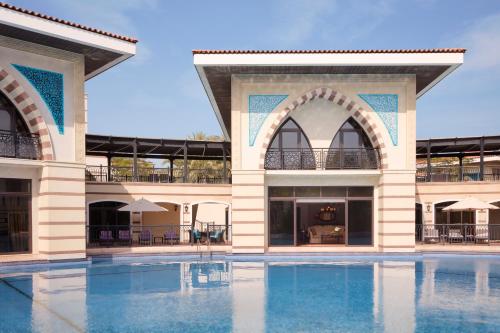 Four Bedroom Royal Lagoon Pool access Villa, Complimentary Soft Drinks minibar, Daily in Villa Breakfast & Butler Service