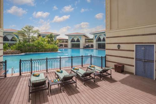 Four Bedroom Royal Lagoon Pool access Villa, Complimentary Soft Drinks minibar, Daily in Villa Breakfast & Butler Service