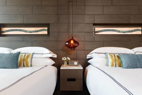 Essential Queen Room with Two Queen Beds and Mountain View