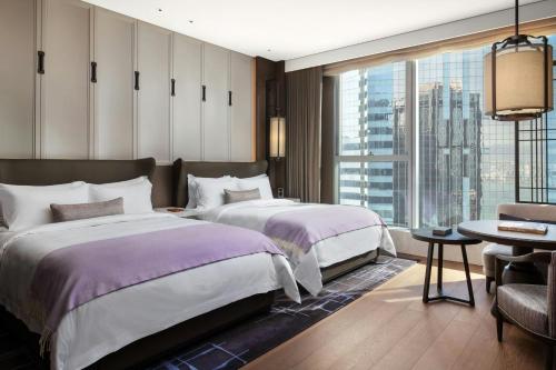 Deluxe Room with 2 Queen Beds and City View