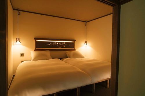TOKONATSU Room with Tatami Area and Garden View