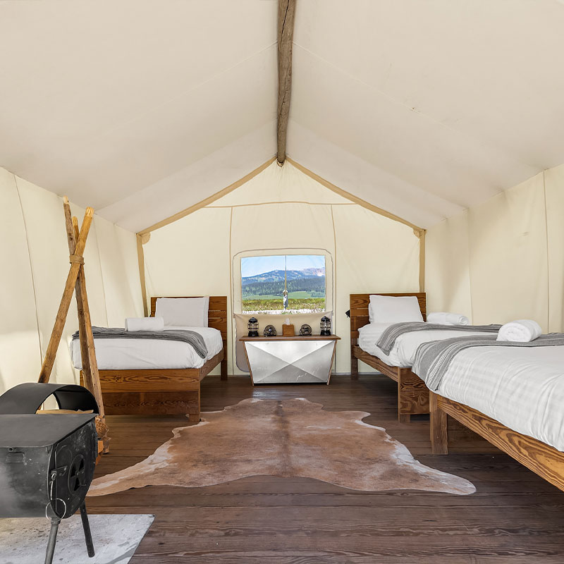 Safari Tent with Three Twin Beds and a Shared Bathroom