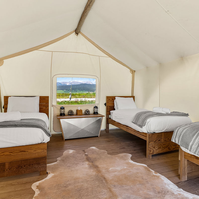 Safari Tent with Three Twin Beds and a Shared Bathroom