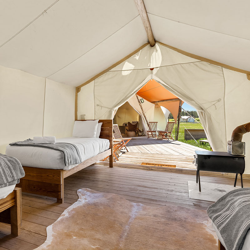 Safari Tent with Three Twin Beds and a Shared Bathroom