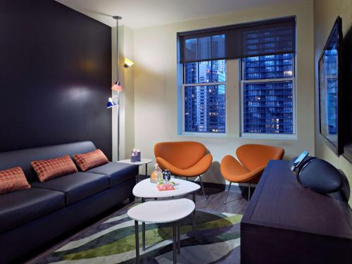 Queen Suite with Two Queen Beds with Sofa Bed and City View - Non-Smoking