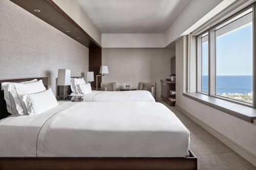 Double Room with Two Double Beds and Seafront View