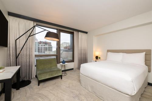 Room with One King Bed and One Queen Bed