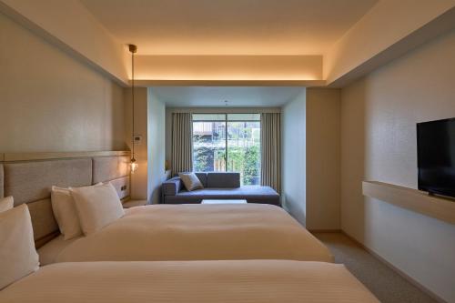 Deluxe Twin Room with Sofa Bed - Non-Smoking