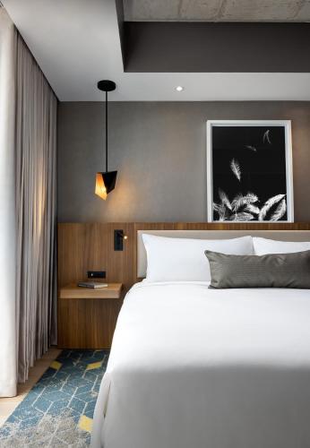 Deluxe Corner Queen Room with Two Queen Beds