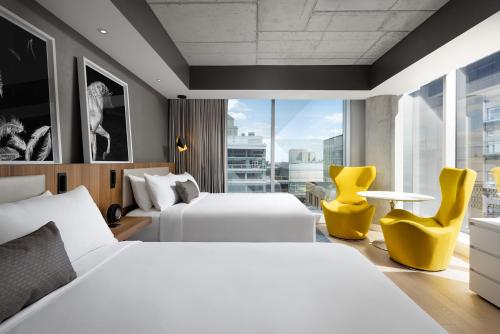 Deluxe Corner Queen Room with Two Queen Beds